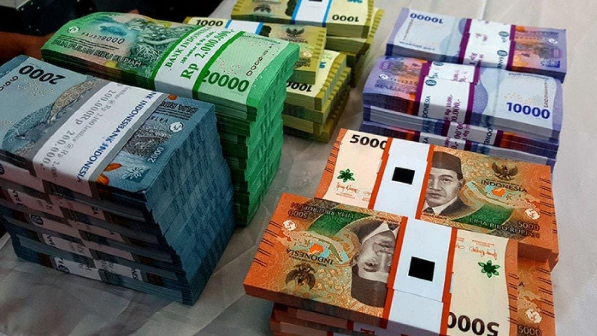 PENUKARAN UANG BARU Ilustrasi uang Rupiah baru kas keliling Bank Indonesia