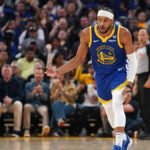 Warriors Moses Moody celebrates a three pointer